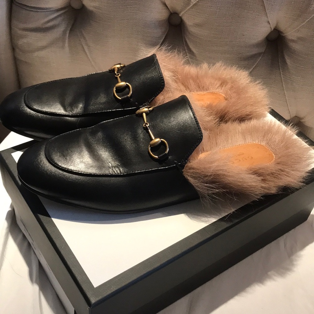 GUCCI
Princetown Leather Slippers